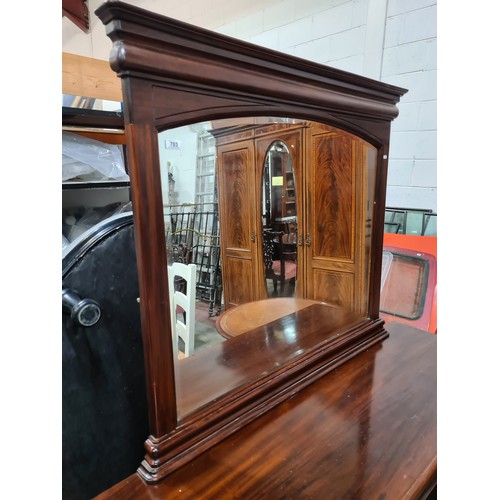 703 - A simply stunning large sit in dresser featuring a magnificent large beveled mirror to top, with thr... 