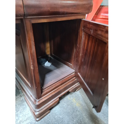 703 - A simply stunning large sit in dresser featuring a magnificent large beveled mirror to top, with thr... 