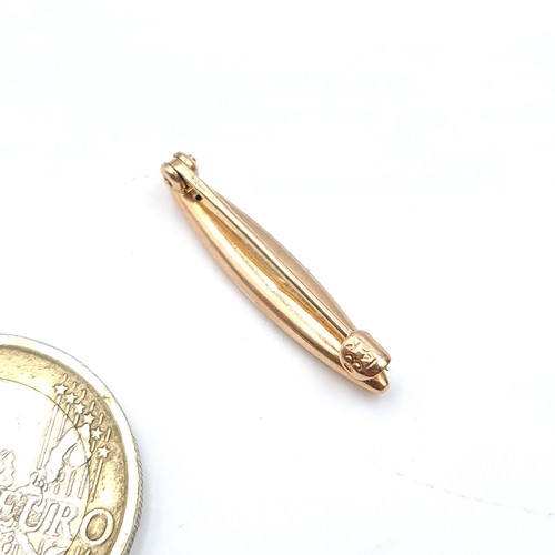 885 - A fabulous antique Etruscan style 14K gold brooch set machine cut detailing, weight 1 gram, pin inta... 