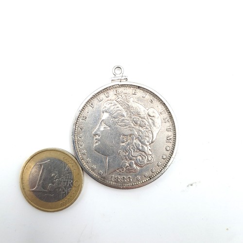 907 - An antique silver USA one dollar coin dating to 1883, suitable to be worn as a pendant, weight 28.86... 