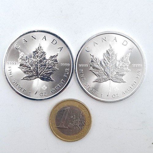 915 - A collection of two mint Canadian five dollar coins, dated 2017, each 1 ounce proof. Uncirculated.