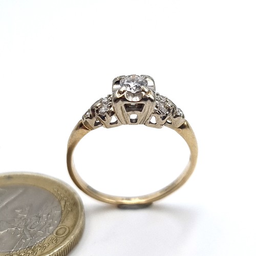 956 - Star Lot A wonderful 14K gold ring featuring  a large solitaire diamond to centre and diamond should... 