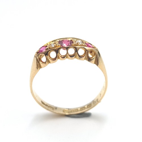 1 - Star Lot : An 18K gold pink tourmaline stone ring, set with two diamonds and two pink topaz stones, ... 