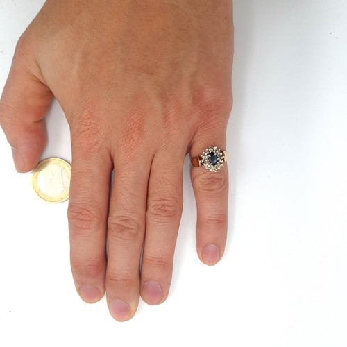 4 - Star Lot : A 9K gold hallmarked ring dating mid-century, ring set with a raised mount featuring a da... 