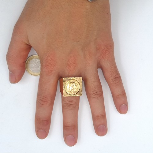 507 - A large Napoleon gents III Emperor  portrait ring. Ring size X. there is marks on the outside of the... 