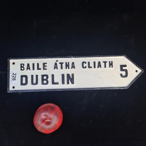 228 - A cast metal direction plaque for Dublin.