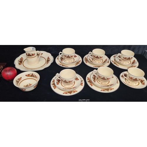 277 - An elegant 20 piece Wedgewood porcelain tea set with vibrant floral motifs, complete with cups, sauc... 