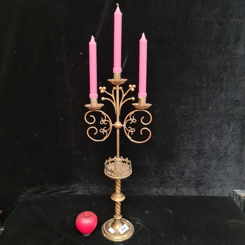 258 - Star lot : A gorgeous antique church brass candle holder with intricate scrollwork, featuring capaci... 