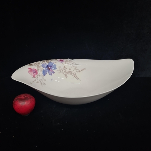 260 - A fabulous large Villeroy & Boch porcelain fruit bowl featuring a hand-painted floral motif.