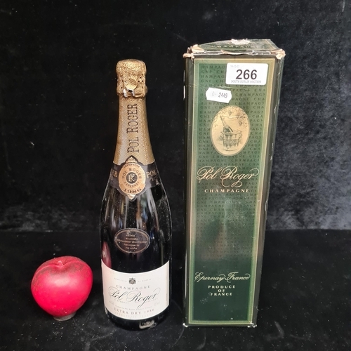 266 - A sealed bottled of Pol Roger Champagne, pristine with original box, inviting connoisseurs to savor ... 