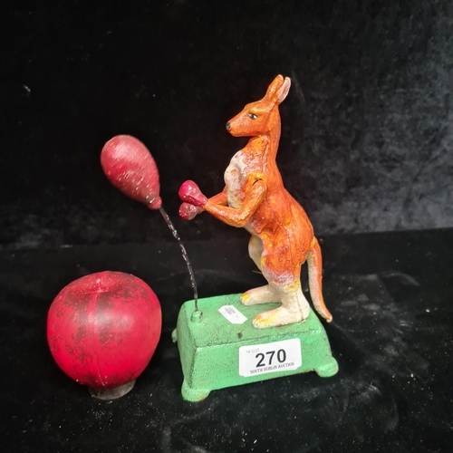 270 - A fun cast iron heavy boxing kangaroo toy figure with articulated arms and punch bag.