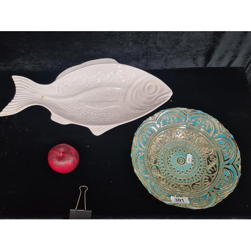 301 - Two items including an elegant white ceramic fish dish, boasting a glossy finish and graceful lines.... 