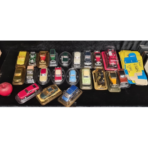 320 - A collection of 21 Corgi and Solido, A century of cars die cast model cars and trucks.  Each piece b... 