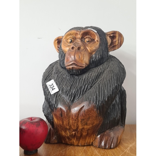 334 - A charming hand-carved heavy wooden chimpanzee sculpture with hinged lid. Rich in texture and expres... 