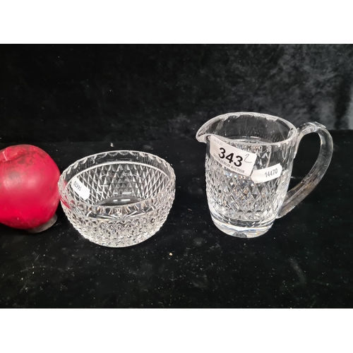 343 - Elegant Waterford crystal duo features a radiant sugar bowl and a sleek whiskey jug pitcher, ideal f... 