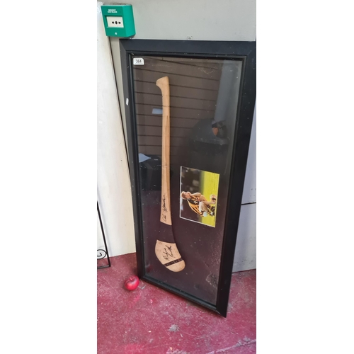 364 - Star Lot : A framed signed hurley featuring an image and hand signed signature of the legendary Kilk... 