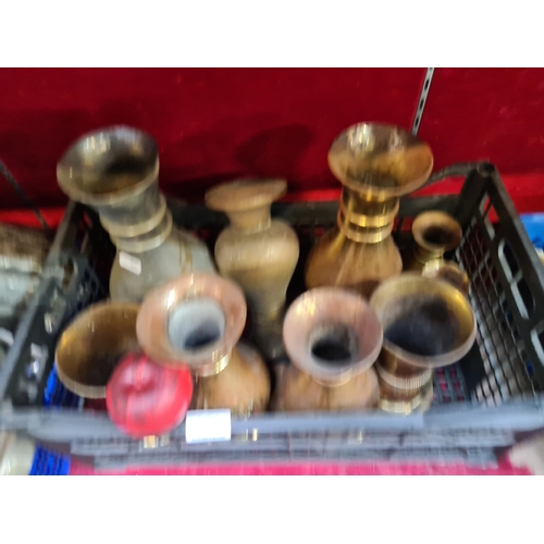 374 - An elegant collection of antique church brass vases.