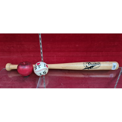 381 - An iconic Looney Tunes Slugger baseball bat, accompanied by a Love NY-themed baseball.