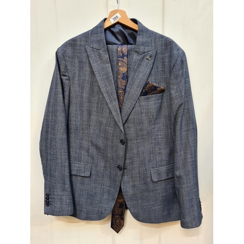 395 - A very snazzy two piece suit by Suitmen, in the Cool Yelekli Takim design. Complete with a paisley s... 