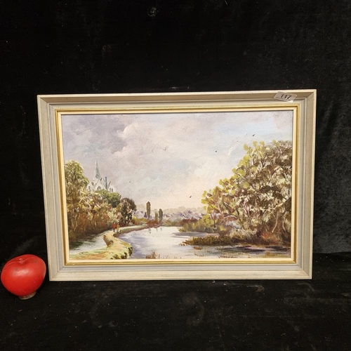 117 - A beautiful original vintage oil on board painting featuring a riverside landscape scene with two fi... 