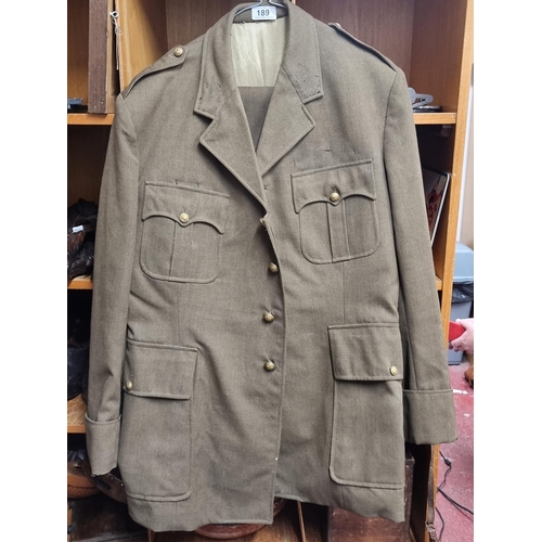 189 - An original WW2 British  military uniform comprising of a jacket and trousers with brass buttons.