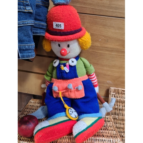 405 - A cheerful hand-crafted knitted clown plush toy holding various tools. Features great detail. In goo... 