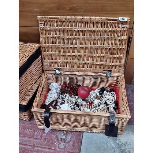 416 - A lovely wicker Donnybrook Fair picnic hamper containing a collection of approx. 15 various shell ne... 