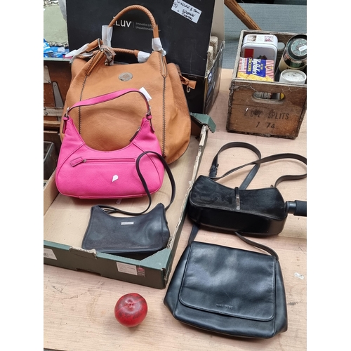 459 - A selection of five stylish ladies handbags. Inc leather examples.