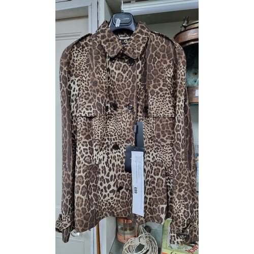 699 - Star Lot: A beautiful brand new with tags ladies Dolce & Gabbana animal print jacket, boasting butto... 