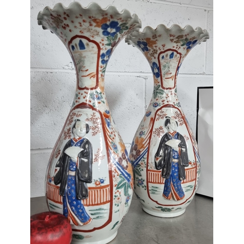 733 - Star Lot : A lovely pair of antique Japanese vases featuring profuse fluted rims, with Japanese men ... 