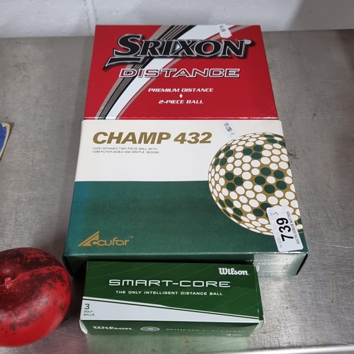 739 - A collection of 25 new gold balls including brands Wilson, Srixon and Spalding. In original packagin... 