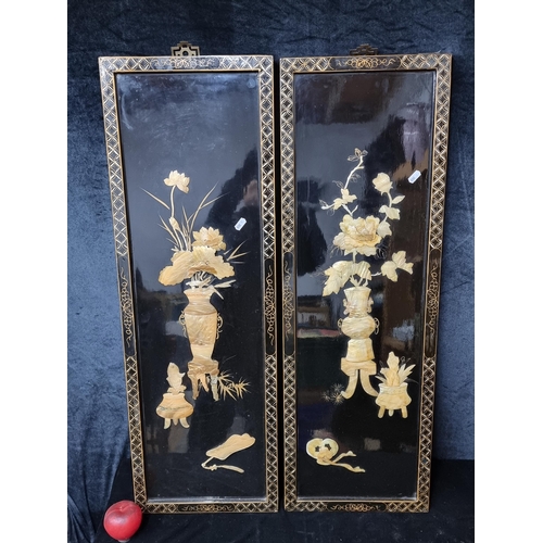 759 - A beautiful pair of vintage lacquered wood wall plaques boasting fabulous Japanese  scenes rendered ... 