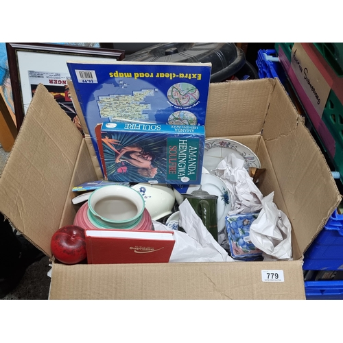 779 - A large  mixed box of miscellaneous items including ceramics, books and maps.