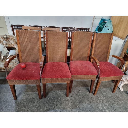 792 - Four heavy duty mid century rattan back dining chairs, by the acclaimed Loom furniture. These exampl... 