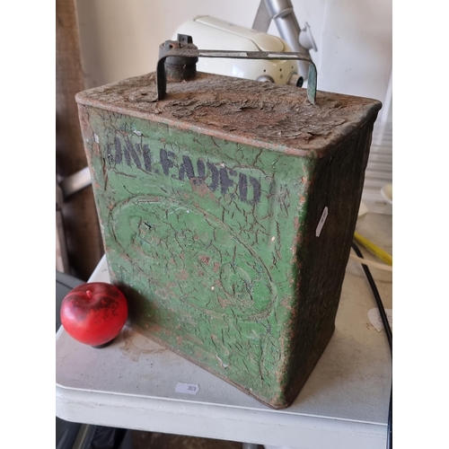 812 - A vintage Esso petrol can with clear branding and the word Unleaded.