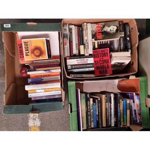 840 - Three boxes filled with a large number of books on a variety of subjects such as WWII and the Holoca... 