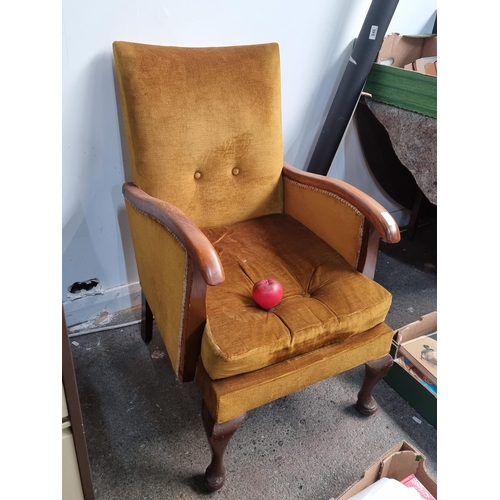 844 - A gorgeous vintage Mid Century Modern armchair with high back, polished wooden armrests, comfortable... 