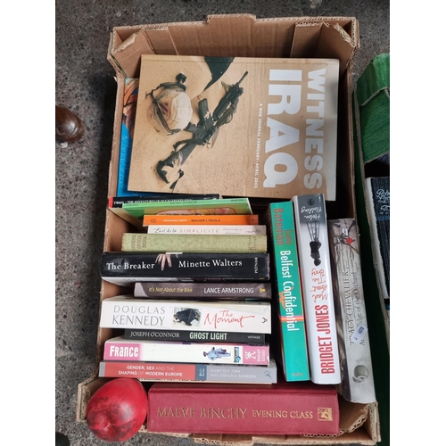 848 - A crate filled with books including both fiction and non fiction, with titles such as 