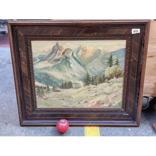 912 - A compelling original oil on board painting featuring a mountainscape scene of soaring blue green mo... 