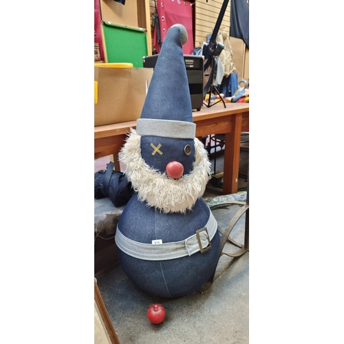 915 - A very large playful denim figure of Santa Claus, once used as a display piece in the Jack & Jones c... 