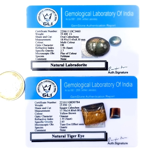 926 - Two natural gem stones including a tigers eye of 15.95 cts and a labradorite of 19.4 cts both stones... 