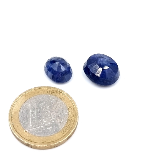 935 - Two gem stones consisting of a natural sapphire of 6.87 cts together with a further sapphire stone o... 