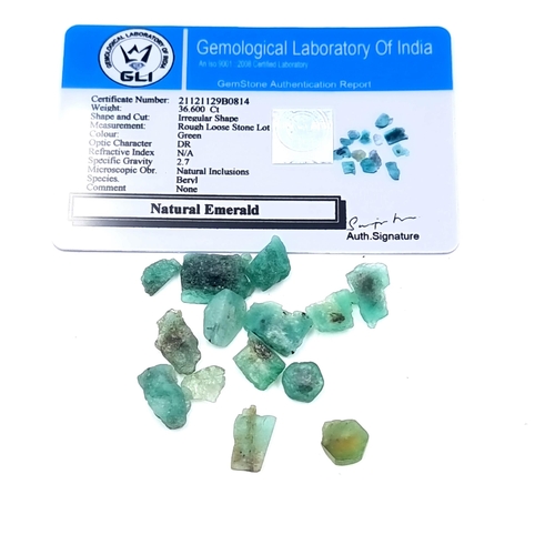 937 - A rough collection of emerald stones, total weight 36.6 cts, comes with certfifcation.