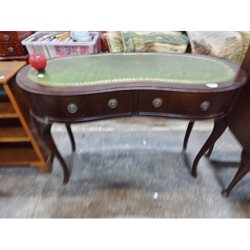 626 - Star Lot : A fabulous vintage kidney table with two drawers to front fitted with metal drop handles.... 