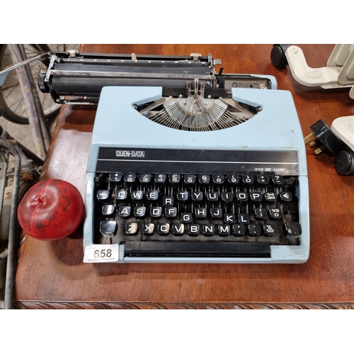 658 - A super 1970's Quen data 610 de luxe typewriter with duck egg blue finish.