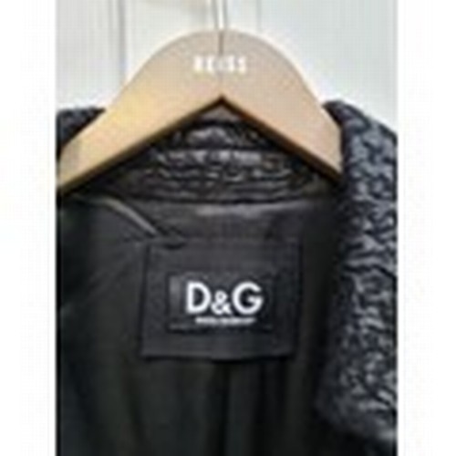 700 - Star Lot: A gorgeous brand new with tags ladies Dolce & Gabbana classic style coat. Featuring a fabu... 