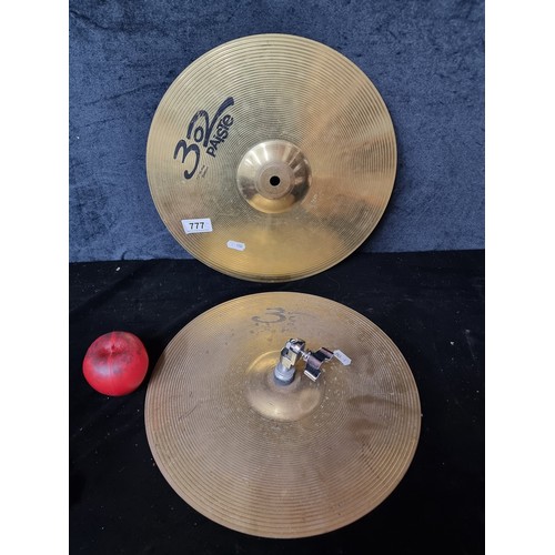 777 - A pair of Paister 302 drum cymbals. Both are made from MS63 brass alloy and have a nice, even sound,... 