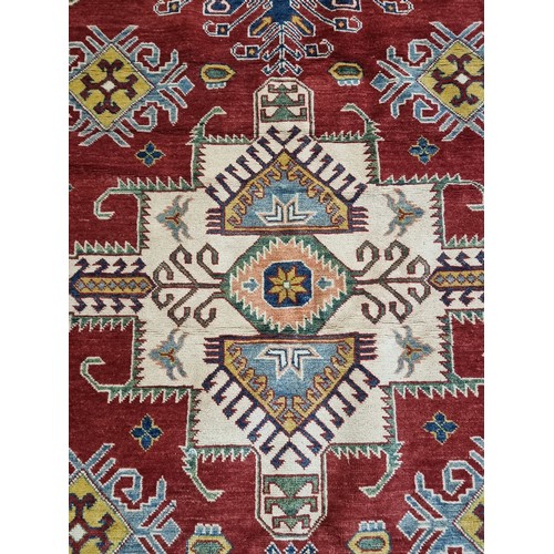 649 - Star Lot: An absolutely stunning large Kazakh hand knotted wool rug / carpet. With classic geometric... 