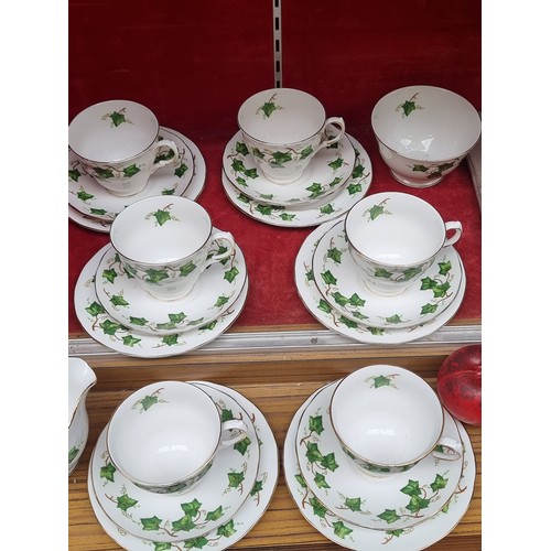 378 - A delightful Colcough bone china tea set in a fabulous ivy gilt design. Includes teacups, saucers, s... 