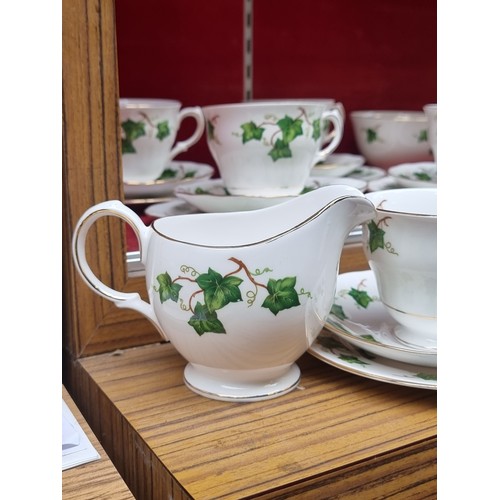 378 - A delightful Colcough bone china tea set in a fabulous ivy gilt design. Includes teacups, saucers, s... 